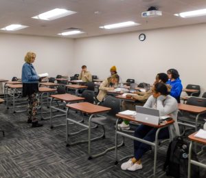 Professor Cindy Wheeler captivates her class with passion and expertise, shaping future careers one lesson at a time.