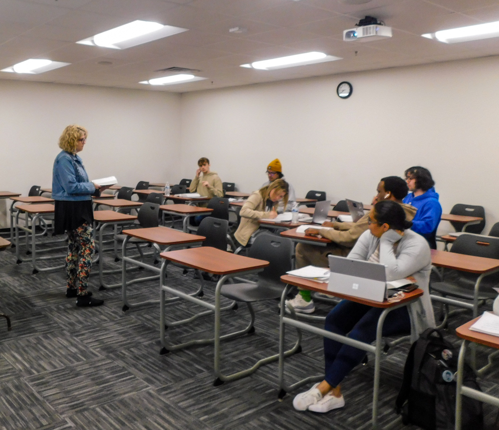 Professor Cindy Wheeler captivates her class with passion and expertise, shaping future careers one lesson at a time.